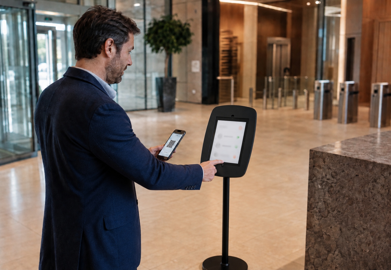 le visiteur s'enregistre lui-même  à la borne libre-service