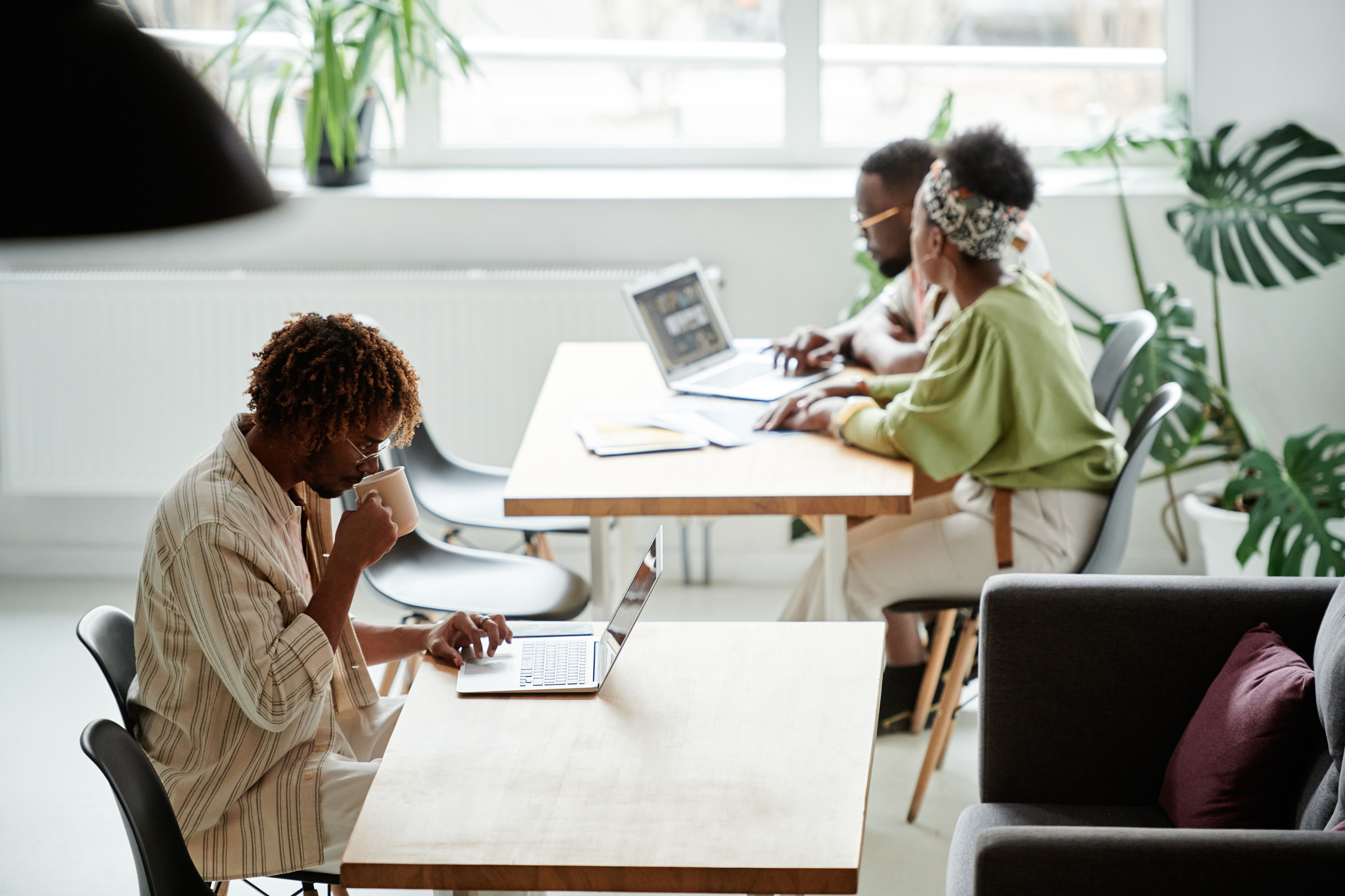 Colleagues working in a hybrid office
